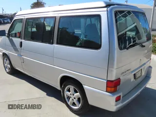 2003 Volkswagen EuroVan MV с VIN WV2NB47003H003033, выставлен на аукционе Copart как лот 59629785 с пробегом 164 173 миль миль и Чистый • Clean title. История ставок и продаж доступна на DreamBid. Изображение 4.