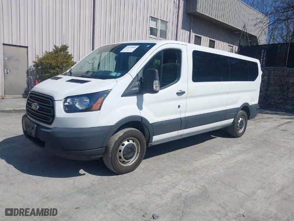 2018 Ford Transit Passenger Wagon XL with VIN 1FBZX2ZM2JKB34166, listed as a IAAI auction lot 41879889 with 152,692 mi miles. Bid and sale history available at carsss.com. Image 2.