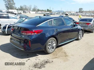 2020 Kia Optima Hybrid EX with VIN KNAGU4LE3L5037713, listed as a IAAI auction lot 42011066 with 93,335 mi miles. Bid and sale history available at carsss.com. Image 4.
