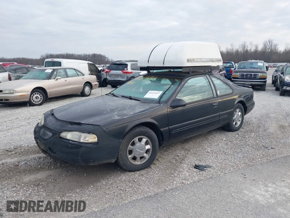 1997 Ford Thunderbird LX z VIN 1FALP62W9VH102330, wystawiony jako IAAI lot #41625557 z przebiegiem 48 826 mil mil oraz . Historia ofert i sprzedaży dostępna na DreamBid. Obrazek 2.