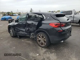 2018 BMW X2 sDrive28i with VIN WBXYJ3C34JEJ91176, listed as a Copart auction lot 63418365 with 62,586 mi miles and Salvage title. Bid and sale history available at DreamBid. Image 2.