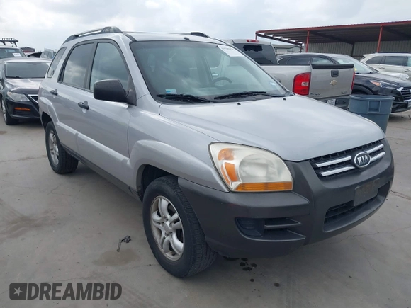 2005 Kia Sportage LX with VIN KNDJF723757087655, listed as a IAAI auction lot 41706354 with 164,736 mi miles and . Bid and sale history available at carsss.com. Image 1.