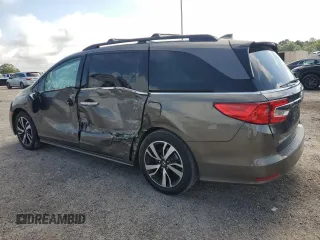 2019 Honda Odyssey Elite z VIN 5FNRL6H90KB027207, wystawiony jako Copart lot #60265905 z przebiegiem 69 313 mil mil oraz Szkoda całkowita • Salvage title. Historia ofert i sprzedaży dostępna na DreamBid. Obrazek 2.