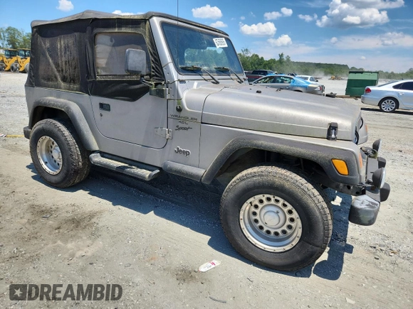2001 Jeep Wrangler Sport with VIN 1J4FA49S21P374356, listed as a Copart auction lot 63568695 with 202,853 mi miles and Clean title. Bid and sale history available at DreamBid. Image 4.