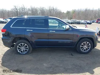 2015 Jeep Grand Cherokee Limited with VIN 1C4RJFBG0FC820717, listed as a IAAI auction lot 41781708 with 137,652 mi miles. Bid and sale history available at carsss.com. Image 13.