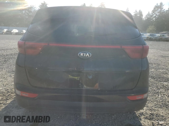 2017 Kia Sportage LX z VIN KNDPMCAC8H7235813, wystawiony jako Copart lot #52716515 z przebiegiem 135 221 mil mil oraz Szkoda całkowita • Salvage title. Historia ofert i sprzedaży dostępna na DreamBid. Obrazek 6.