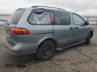 2000 Toyota Sienna LE with VIN 4T3ZF13C2YU217185, listed as a Copart auction lot 82407944 with 244,381 mi miles and Salvage Title. Bid and sale history available at carsss.com. Image 3.