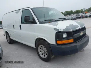2012 Chevrolet Express Cargo Van with VIN 1GCSGAFX7C1124523, listed as a IAAI auction lot 40328756 with 266,445 mi miles. Bid and sale history available at carsss.com. Image 1.