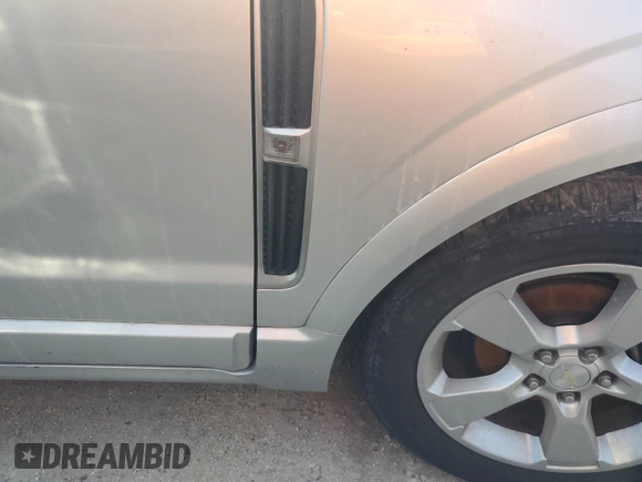 2014 Chevrolet Captiva Sport LTZ with VIN 3GNAL4EK4ES645660, listed as a Copart auction lot 75703184 with Not Provided miles and Salvage Title. Bid and sale history available at DreamBid. Image 12.