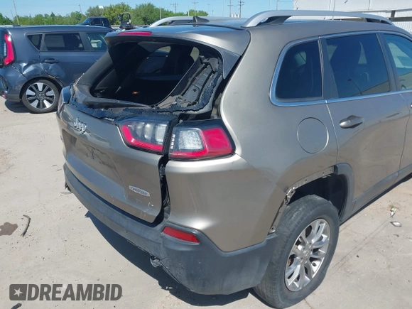 2019 Jeep Cherokee Latitude Plus with VIN 1C4PJMLBXKD233749, listed as a IAAI auction lot 41937698 with 103,988 mi miles and . Bid and sale history available at DreamBid. Image 6.