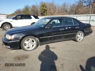 1999 Infiniti Q45 z VIN JNKBY31A6XM602090, wystawiony jako Copart lot #82469314 z przebiegiem 133 983 mil mil oraz Tytuł czysty. Historia ofert i sprzedaży dostępna na DreamBid. Obrazek 1.