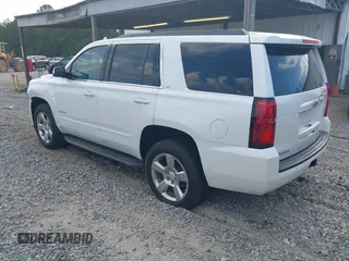 2017 Chevrolet Tahoe LT with VIN 1GNSKBKC3HR356480, listed as a IAAI auction lot 42335162 with 145,892 mi miles and . Bid and sale history available at DreamBid. Image 3.