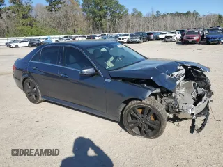 2014 Mercedes-Benz E 350 Sport with VIN WDDHF5KB6EA969855, listed as a Copart auction lot 49295495 with 63,898 mi miles and Salvage Title. Bid and sale history available at DreamBid. Image 4.