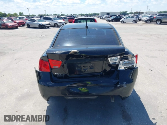 2010 Kia Forte EX with VIN KNAFU4A20A5847351, listed as a IAAI auction lot 41897921 with 129,084 mi miles. Bid and sale history available at carsss.com. Image 16.