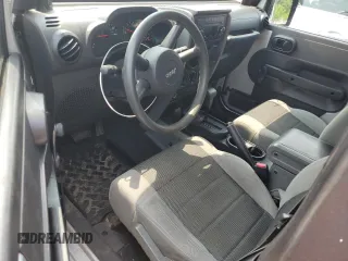 2007 Jeep Wrangler X with VIN 1J4FA24117L202404, listed as a Copart auction lot 58690485 with 126,347 mi miles and Salvage title. Bid and sale history available at DreamBid. Image 8.