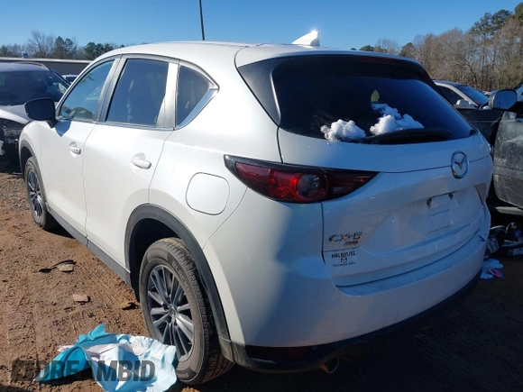 2020 Mazda CX-5 Touring with VIN JM3KFBCM0L0828207, listed as a IAAI auction lot 41305801 with 56,500 mi miles and . Bid and sale history available at DreamBid. Image 3.