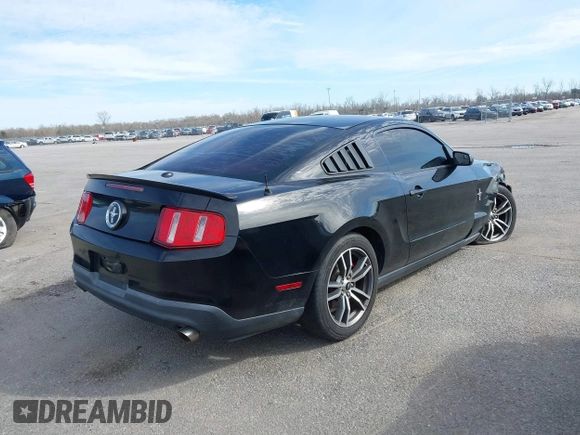 2011 Ford Mustang V6 with VIN 1ZVBP8AM0B5102857, listed as a IAAI auction lot 41622135 with 144,246 mi miles and . Bid and sale history available at carsss.com. Image 4.
