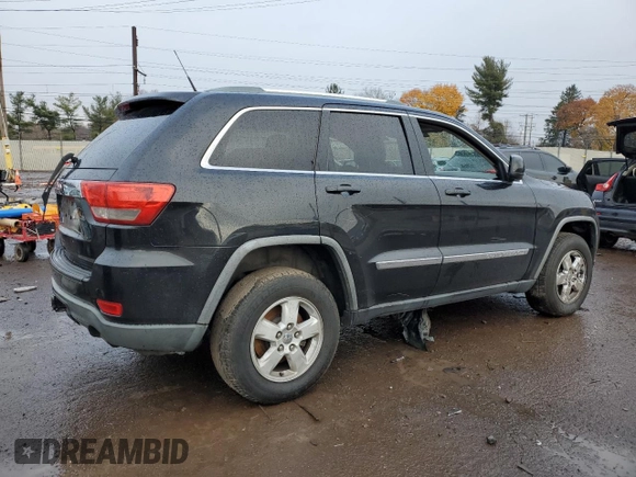 2011 Jeep Grand Cherokee Laredo with VIN 1J4RS4GG8BC508482, listed as a Copart auction lot 79261304 with 208,265 mi miles and Salvage Title. Bid and sale history available at DreamBid. Image 3.