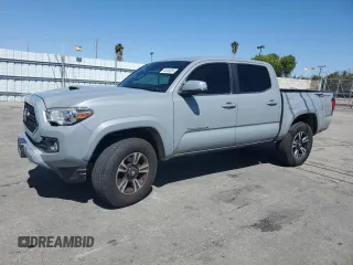 2018 Toyota Tacoma SR5 with VIN 3TMAZ5CN5JM058750, listed as a Copart auction lot 48359355 with 95,164 mi miles and Salvage Title. Bid and sale history available at DreamBid. Image 1.