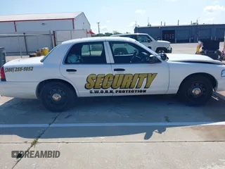 2009 Ford Police Interceptor with VIN 2FAHP71V99X141896, listed as a IAAI auction lot 39829556 with Not provided miles and . Bid and sale history available at DreamBid. Image 14.