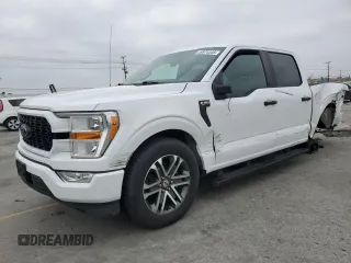 2021 Ford F-150 XL with VIN 1FTEW1CP4MKD82658, listed as a Copart auction lot 59974345 with 87,912 mi miles and Salvage title. Bid and sale history available at DreamBid. Image 1.