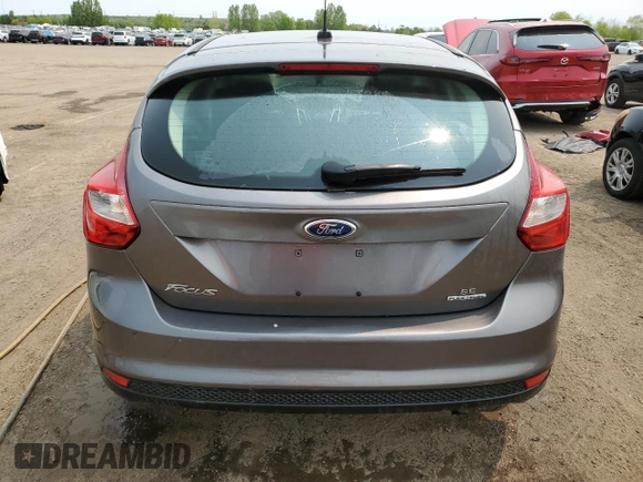 2014 Ford Focus SE z VIN 1FADP3K29EL187201, wystawiony jako Copart lot #59125805 z przebiegiem Nie podano mil oraz Szkoda całkowita • Salvage title. Historia ofert i sprzedaży dostępna na DreamBid. Obrazek 6.