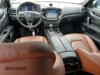 2018 Maserati Ghibli z VIN ZAM57XSA9J1271727, wystawiony jako Copart lot #52155305 z przebiegiem 62 081 mil mil oraz Szkoda całkowita • Salvage title. Historia ofert i sprzedaży dostępna na DreamBid. Obrazek 8.