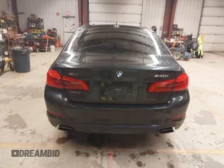 2019 BMW 5 Series 540i xDrive with VIN WBAJE7C53KWW12941, listed as a IAAI auction lot 41016611 with 77,499 mi miles and . Bid and sale history available at DreamBid. Image 16.