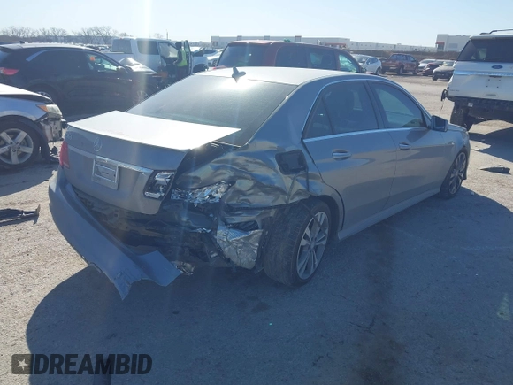 2014 Mercedes-Benz E 350 Sport with VIN WDDHF5KB3EA971983, listed as a IAAI auction lot 41766040 with 95,321 mi miles and . Bid and sale history available at carsss.com. Image 4.