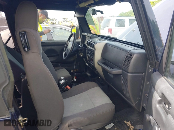 2006 Jeep Wrangler X with VIN 1J4FA39S36P763346, listed as a IAAI auction lot 42321825 with 104,077 mi miles and . Bid and sale history available at DreamBid. Image 5.