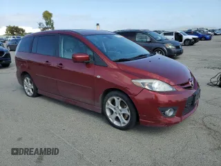 2009 Mazda 5 Touring z VIN JM1CR29L690331139, wystawiony jako Copart lot #54274725 z przebiegiem 168 240 mil mil oraz Czysty tytuł • Clean title. Historia ofert i sprzedaży dostępna na DreamBid. Obrazek 4.