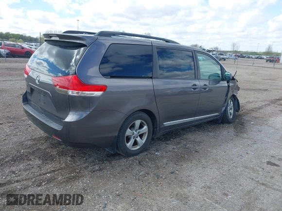 2012 Toyota Sienna LE AAS with VIN 5TDKK3DC5CS270481, listed as a IAAI auction lot 42093687 with 208,899 mi miles. Bid and sale history available at carsss.com. Image 4.