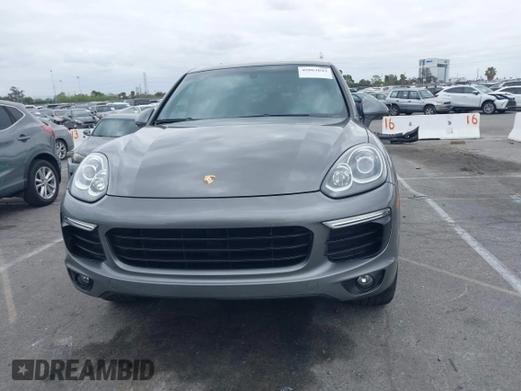 2016 Porsche Cayenne with VIN WP1AA2A27GKA15797, listed as a IAAI auction lot 42063043 with 81,464 mi miles. Bid and sale history available at carsss.com. Image 12.