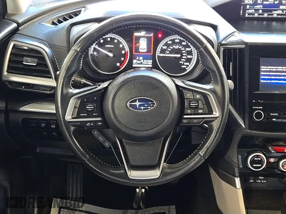 2023 Subaru Forester Premium with VIN JF2SKAEC1PH494927, listed as a IAAI auction lot 42566378 with 77,411 mi miles and . Bid and sale history available at DreamBid. Image 14.