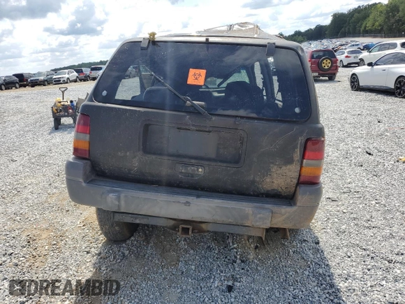 1996 Jeep Grand Cherokee Laredo with VIN 1J4FX58S6TC349590, listed as a Copart auction lot 72278714 with 0 mi miles and Salvage Title. Bid and sale history available at carsss.com. Image 6.