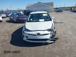 2017 Toyota Prius Two z VIN JTDKARFU4H3053749, wystawiony jako IAAI lot #41816036 z przebiegiem 151 594 mil mil oraz . Historia ofert i sprzedaży dostępna na DreamBid. Obrazek 12.