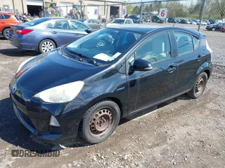 2013 Toyota Prius One z VIN JTDKDTB36D1034028, wystawiony jako IAAI lot #42172387 z przebiegiem 245 325 mil mil oraz . Historia ofert i sprzedaży dostępna na DreamBid. Obrazek 17.