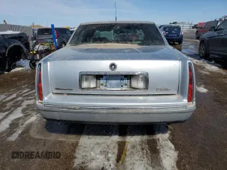 1999 Cadillac DeVille z VIN 1G6KD54Y5XU774986, wystawiony jako Copart lot #50167955 z przebiegiem 151 375 mil mil oraz Czysty tytuł • Clean title. Historia ofert i sprzedaży dostępna na DreamBid. Obrazek 6.