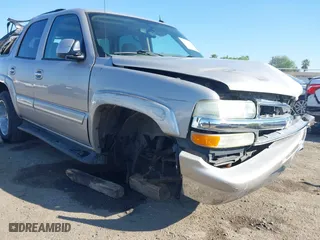 2004 Chevrolet Tahoe LS with VIN 1GNEC13T64J282970, listed as a IAAI auction lot 41879458 with 205,952 mi miles. Bid and sale history available at carsss.com. Image 6.