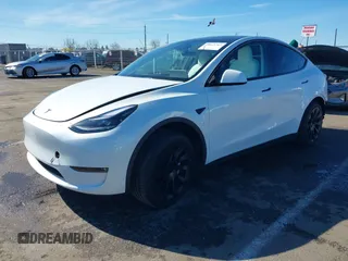 2023 Tesla Model Y Long Range with VIN 7SAYGDEE0PF945202, listed as a IAAI auction lot 41611762 with 7,316 mi miles and . Bid and sale history available at DreamBid. Image 17.