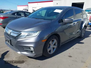 2018 Honda Odyssey EX-L z VIN 5FNRL6H7XJB067694, wystawiony jako IAAI lot #42177338 z przebiegiem 159 670 mil mil oraz . Historia ofert i sprzedaży dostępna na DreamBid. Obrazek 19.