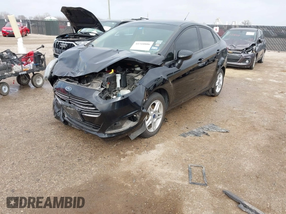 2019 Ford Fiesta SE z VIN 3FADP4BJ7KM158142, wystawiony jako IAAI lot #41510806 z przebiegiem 55 315 mil mil oraz . Historia ofert i sprzedaży dostępna na DreamBid. Obrazek 17.