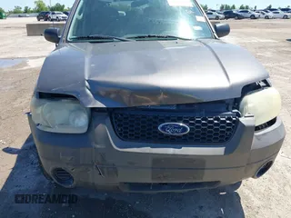 2006 Ford Escape XLS with VIN 1FMYU02Z06KC95676, listed as a IAAI auction lot 42220561 with 169,925 mi miles and . Bid and sale history available at DreamBid. Image 6.