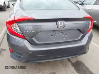 2017 Honda Civic LX with VIN 19XFC2F52HE233607, listed as a IAAI auction lot 41758632 with 159,290 mi miles and . Bid and sale history available at DreamBid. Image 17.