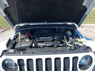 2020 Jeep Wrangler Unlimited Sahara with VIN 1C4HJXEN4LW330867, listed as a IAAI auction lot 41790709 with 63,151 mi miles. Bid and sale history available at carsss.com. Image 10.