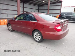 2003 Toyota Camry LE with VIN 4T1BE30K03U227243, listed as a IAAI auction lot 42063924 with 177,323 mi miles and . Bid and sale history available at DreamBid. Image 3.