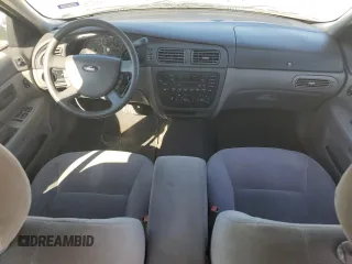 2005 Ford Taurus SE with VIN 1FAFP53U75A302281, listed as a Copart auction lot 53552465 with 100,413 mi miles and Salvage Title. Bid and sale history available at carsss.com. Image 8.