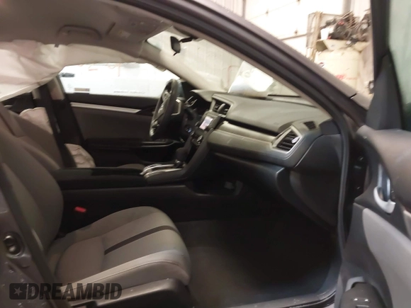 2020 Honda Civic LX z VIN 19XFC2F65LE030888, wystawiony jako IAAI lot #41609630 z przebiegiem 115 614 mil mil oraz . Historia ofert i sprzedaży dostępna na DreamBid. Obrazek 5.