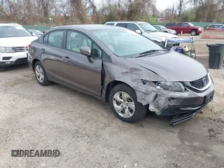 2015 Honda Civic LX with VIN 19XFB2F58FE259497, listed as a IAAI auction lot 41909241 with 124,270 mi miles. Bid and sale history available at carsss.com. Image 1.