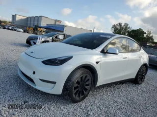 2023 Tesla Model Y Long Range z VIN 7SAYGAEE5PF809727, wystawiony jako Copart lot #43759525 z przebiegiem 29 590 mil mil oraz Szkoda całkowita • Salvage title. Historia ofert i sprzedaży dostępna na DreamBid. Obrazek 1.